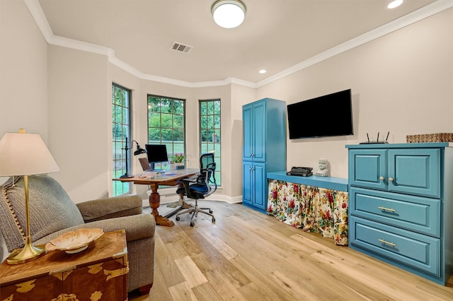 office area featuring light wood-type flooring and crown molding