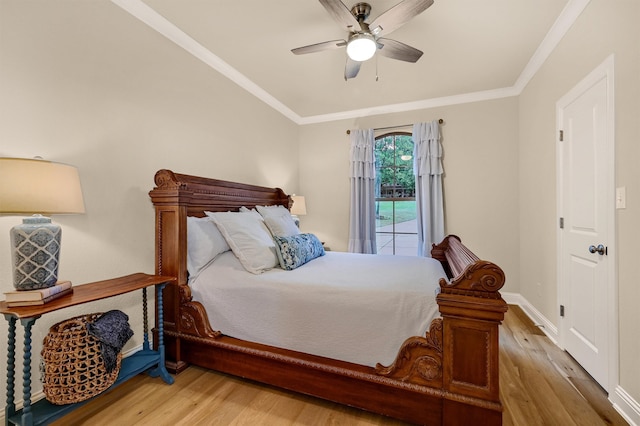 bedroom with ceiling fan, light hardwood / wood-style floors, and ornamental molding