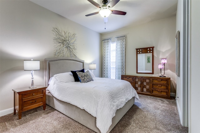 bedroom with ceiling fan and carpet floors