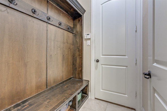 mudroom with light tile patterned floors