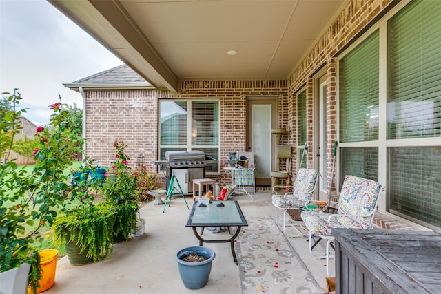 view of patio featuring a grill