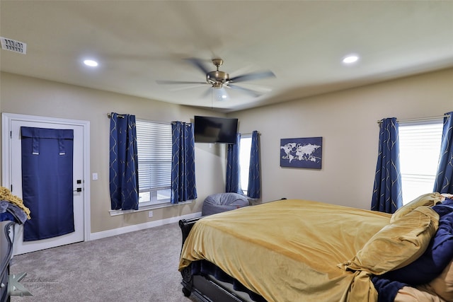 bedroom with ceiling fan and carpet flooring