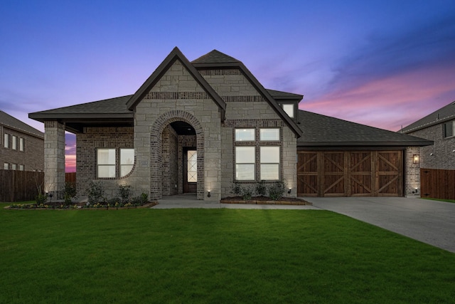 view of front of home featuring a yard