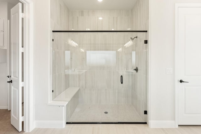 bathroom featuring an enclosed shower