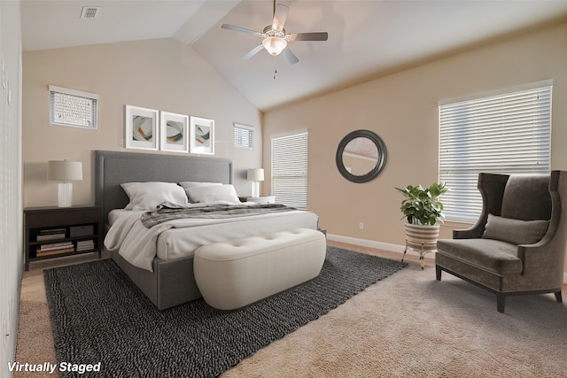 carpeted bedroom featuring vaulted ceiling and ceiling fan