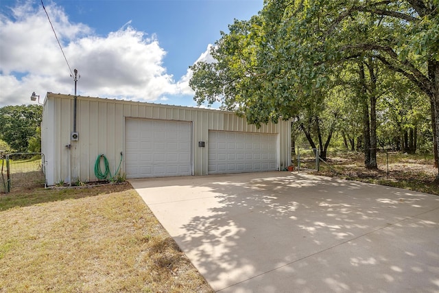 garage with a lawn