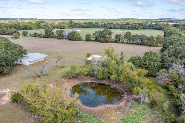 bird's eye view featuring a water view and a rural view