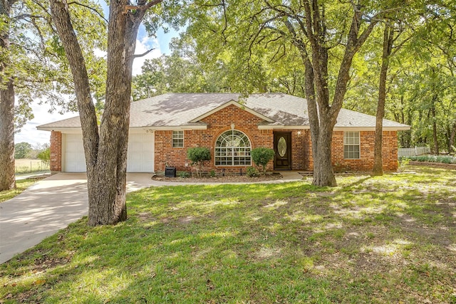 single story home featuring central AC unit, a front yard, and a garage