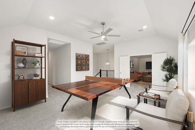 office space with light carpet, vaulted ceiling, and ceiling fan