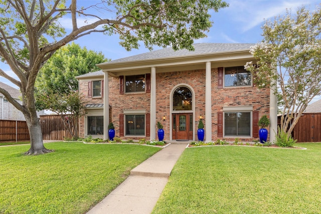 view of front facade with a front yard