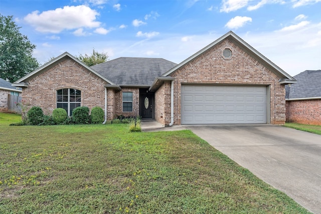 view of front facade featuring a front lawn and a garage