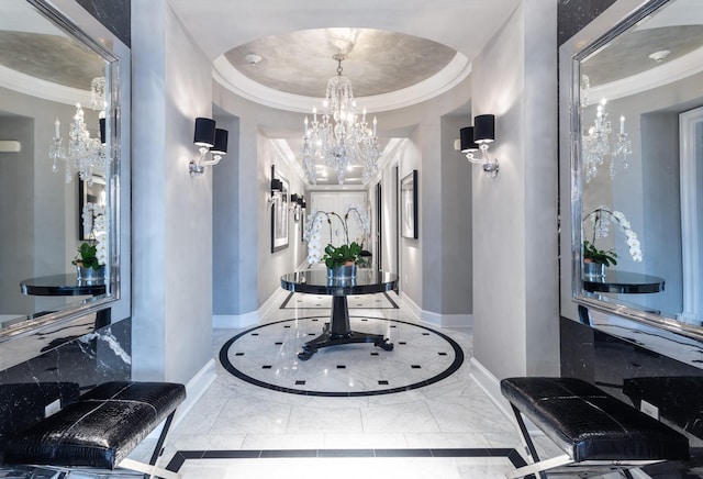 interior space featuring an inviting chandelier and ornamental molding