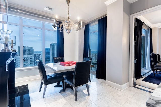 dining area with a chandelier and ornamental molding