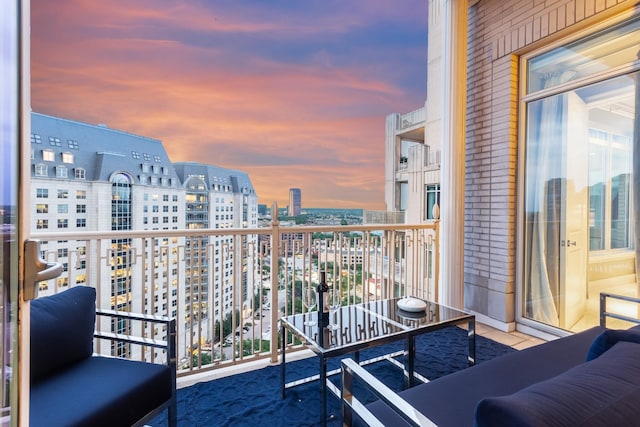 view of balcony at dusk