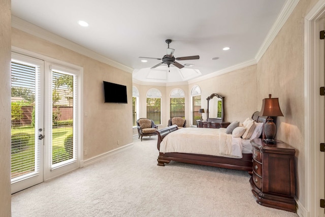 bedroom with ceiling fan, access to exterior, light colored carpet, and multiple windows