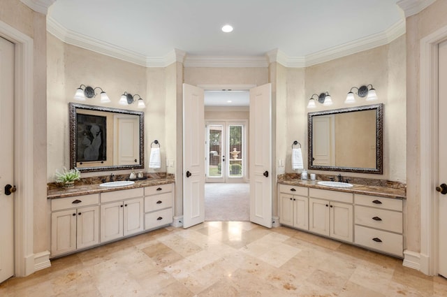 bathroom featuring vanity and ornamental molding