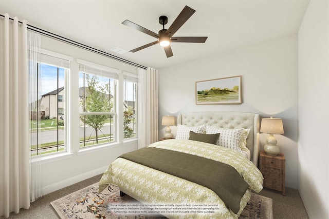 carpeted bedroom with ceiling fan