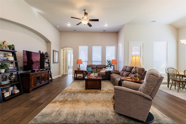 living room with hardwood / wood-style floors and ceiling fan