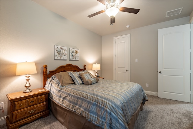 carpeted bedroom with ceiling fan