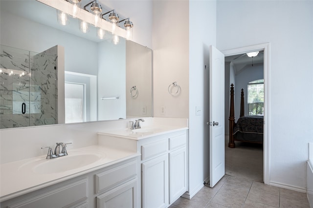 bathroom featuring vanity, tile patterned flooring, and an enclosed shower