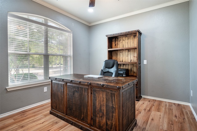 office area with light hardwood / wood-style floors, ornamental molding, and ceiling fan