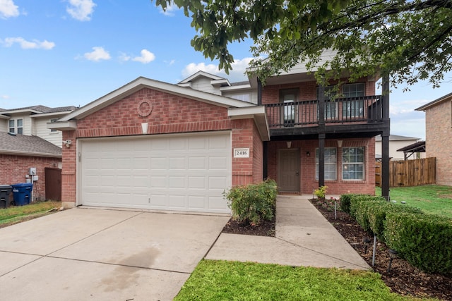 view of front of house with a balcony and a garage