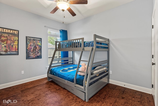 bedroom with ceiling fan and dark wood-type flooring