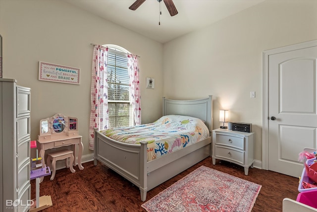 bedroom featuring dark wood-type flooring and ceiling fan