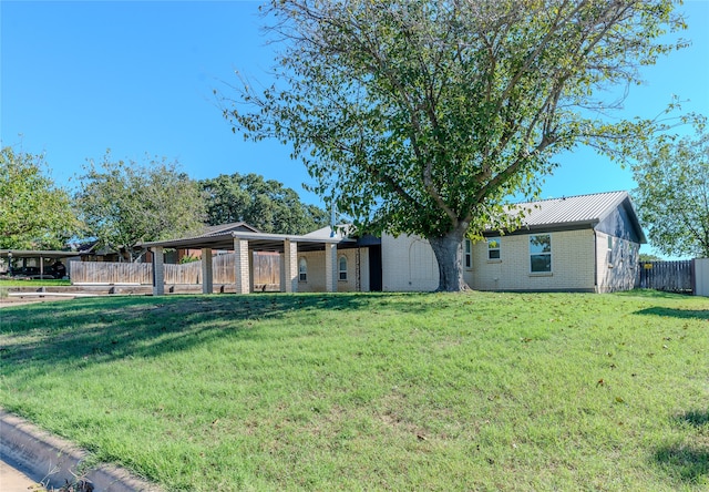 exterior space with a front lawn