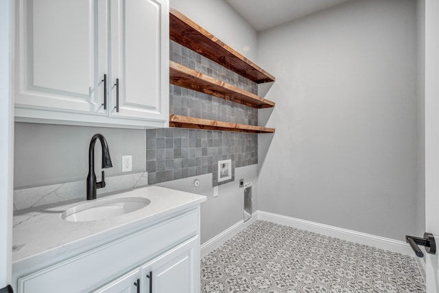 interior space featuring backsplash and vanity