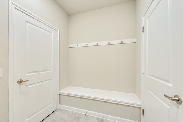 mudroom with light tile patterned floors