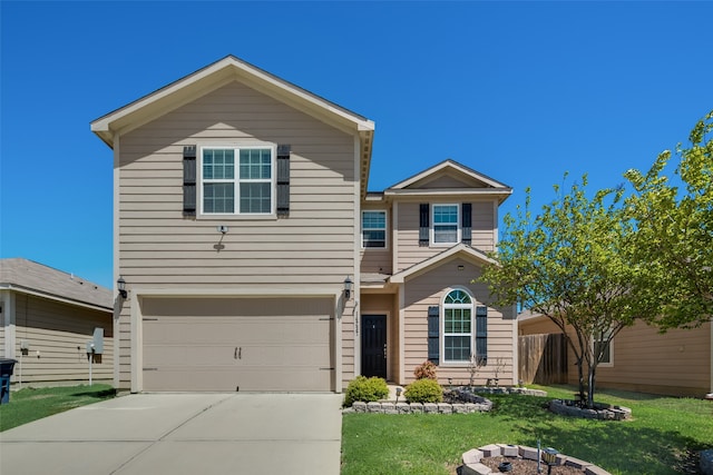 front facade with a garage and a front lawn