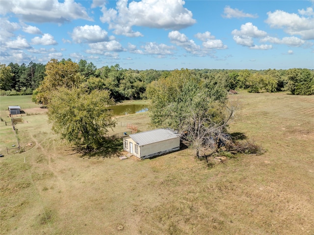 bird's eye view featuring a water view and a rural view