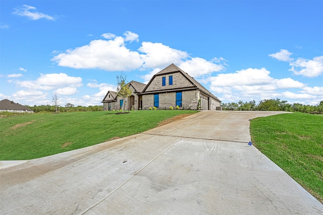 view of front of home with a front lawn