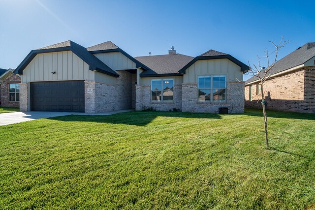 ranch-style home with board and batten siding, a front lawn, brick siding, an attached garage, and concrete driveway