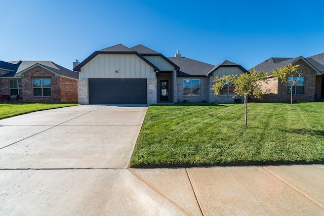 ranch-style home with a garage, concrete driveway, board and batten siding, and a front lawn
