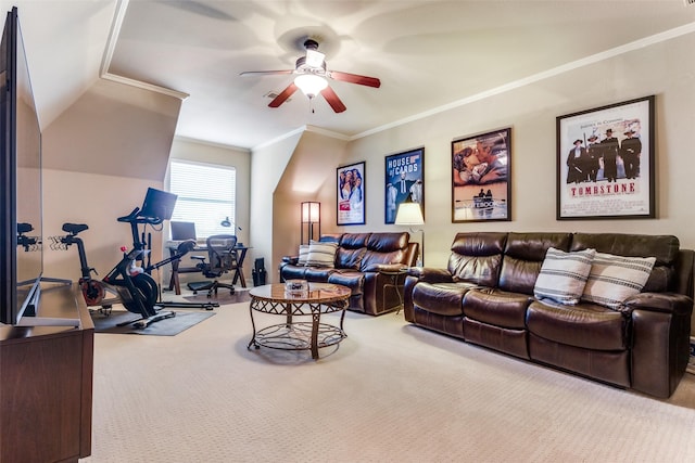 carpeted living room with ornamental molding and ceiling fan