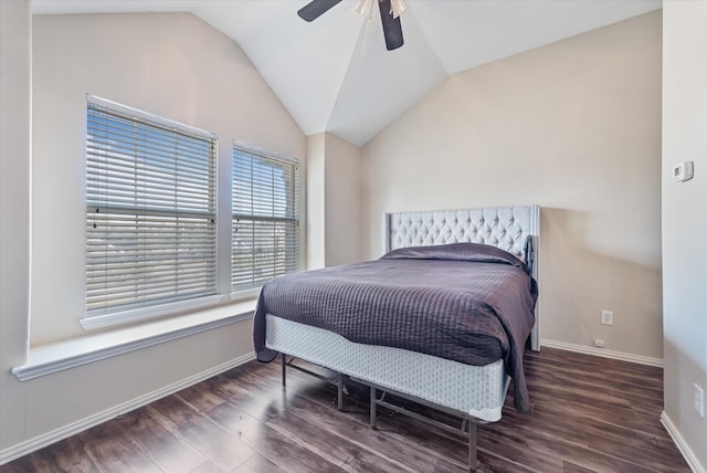 bedroom featuring ceiling fan, lofted ceiling, and dark hardwood / wood-style flooring