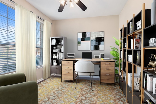 office area featuring ceiling fan and a wealth of natural light