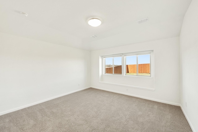 unfurnished room featuring carpet floors