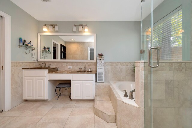 bathroom featuring tile walls, tile patterned flooring, vanity, and toilet