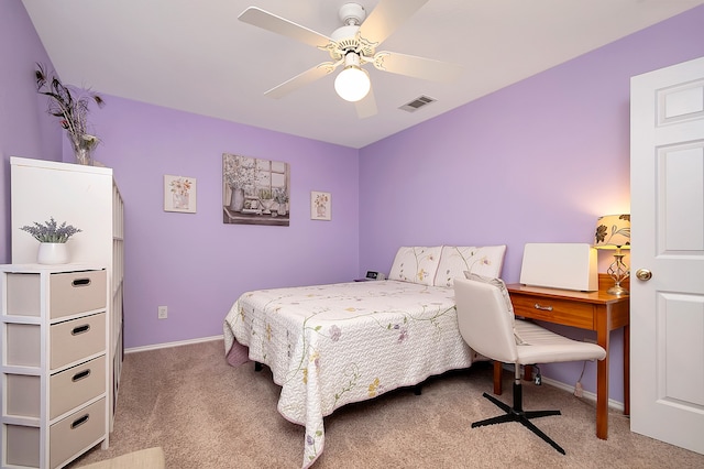 bedroom with ceiling fan and carpet