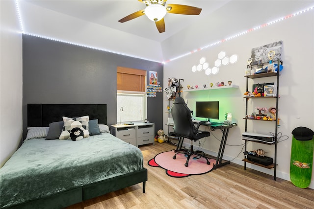 bedroom featuring ceiling fan and light wood-type flooring