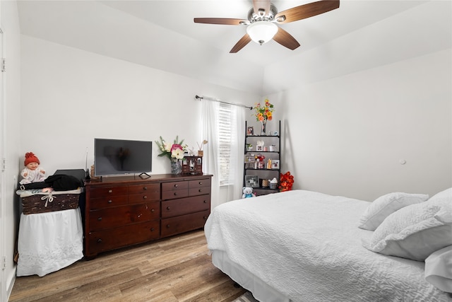 bedroom featuring wood-type flooring and ceiling fan