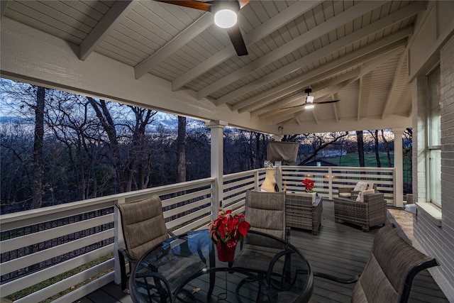 deck with ceiling fan and an outdoor hangout area