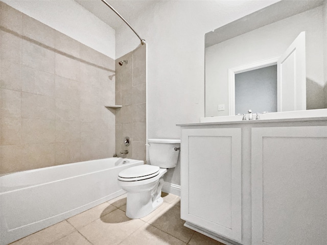 full bathroom with vanity, tiled shower / bath combo, toilet, and tile patterned floors