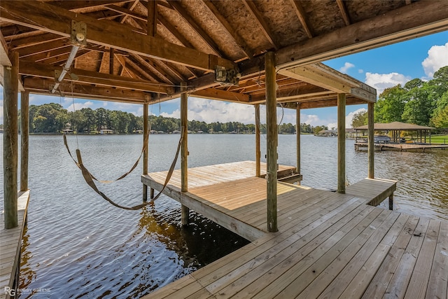 view of dock with a water view