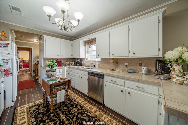 kitchen featuring sink, white cabinets, white refrigerator, hanging light fixtures, and stainless steel dishwasher