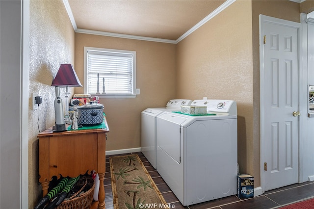 clothes washing area with separate washer and dryer, dark hardwood / wood-style flooring, and ornamental molding