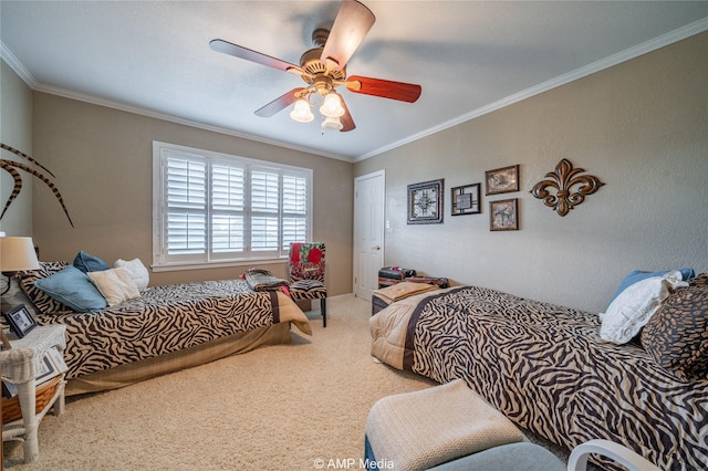 bedroom with crown molding, ceiling fan, and carpet